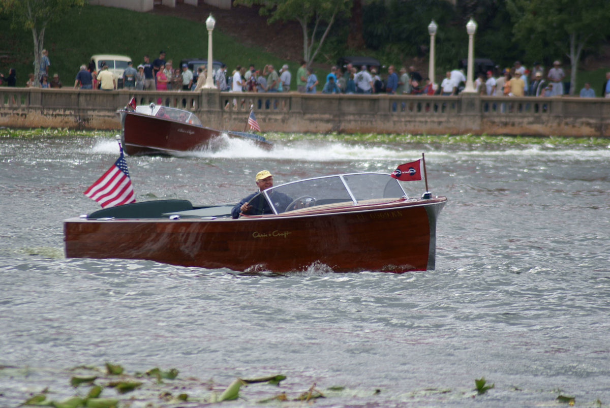 Classic mahogany motorboat on Lake Bomoseen - Mercury outboard powered, ready for freshwater adventure